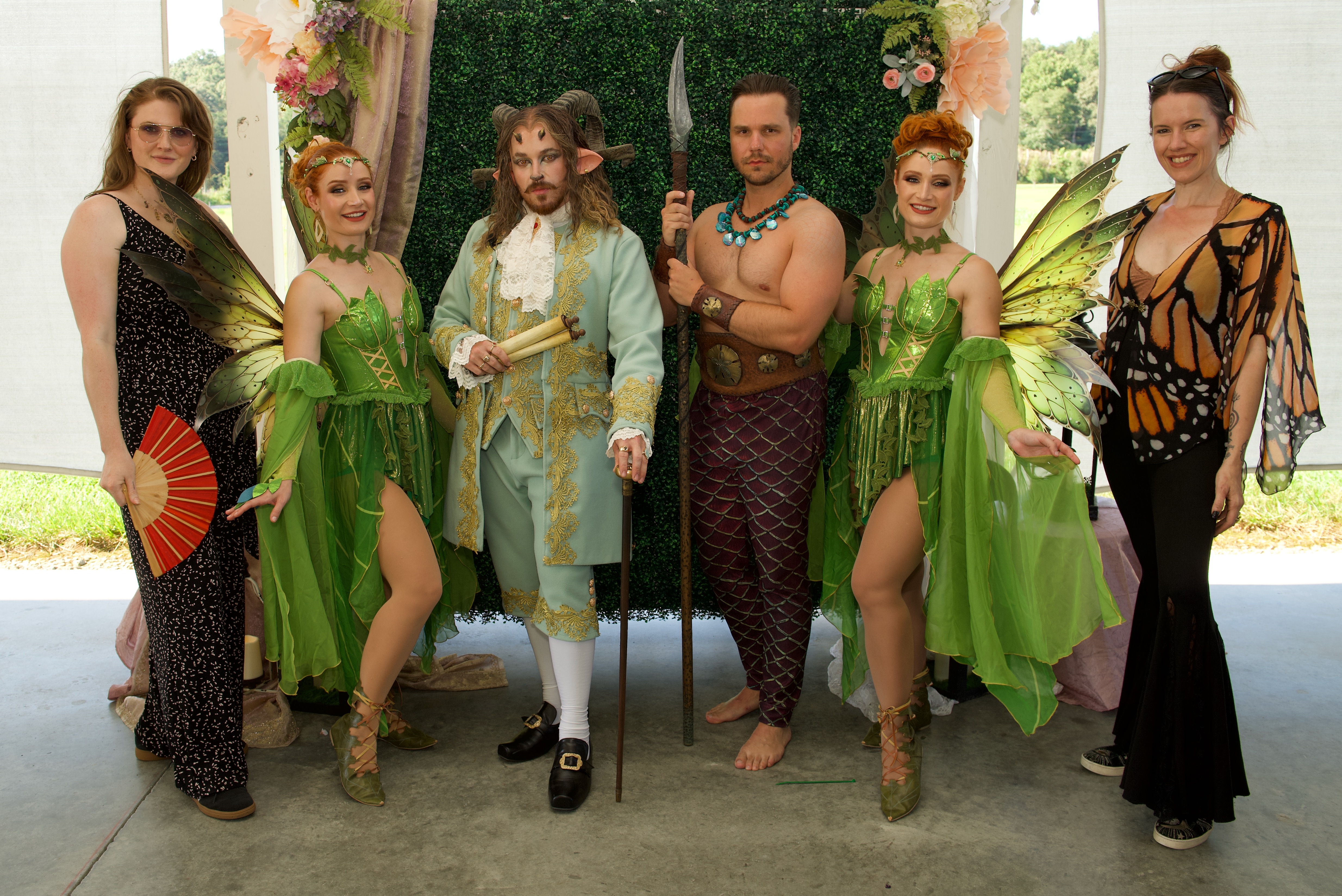 The Art To Life creative team with performers in an immersive woodland setting
